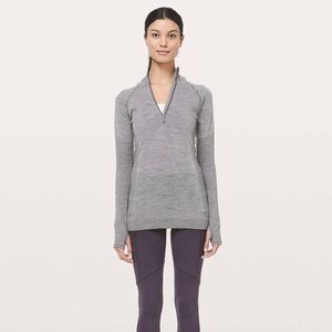 Grey Lululemon quarter zip with a hood